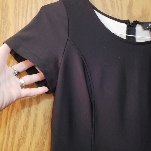 Very pretty black dress with orange/red floral pattern on the bottom. - Picture 4 of 6